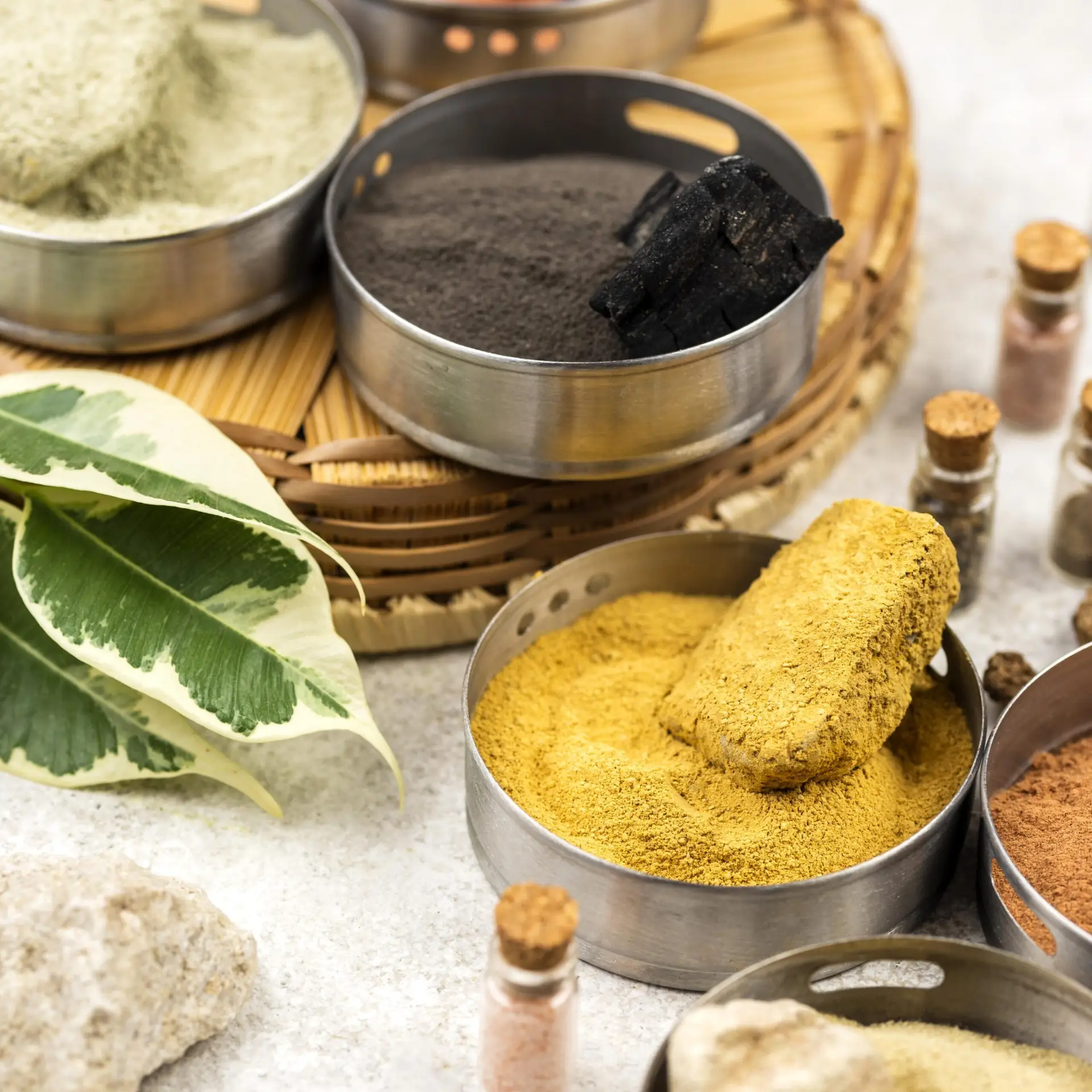 Natural herbal powders and plant-based ingredients used in naturopathic treatment